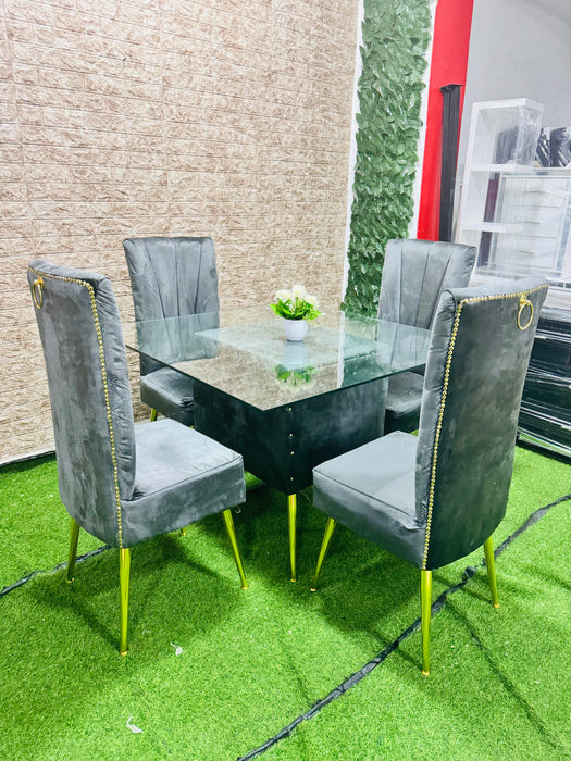 Comedor tapizado gris oscuro para de metal tope de cristal