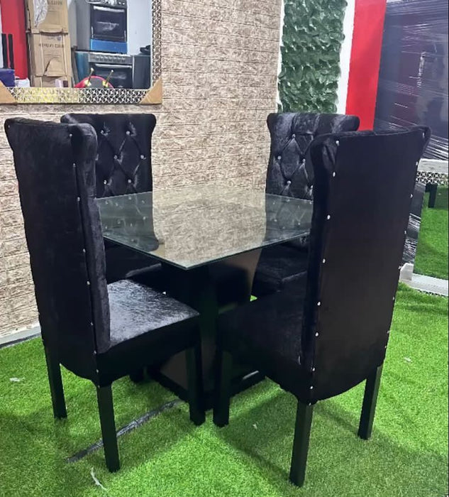 JUEGO DE COMEDOR TAPIZADO NEGRO CAPITONEADO